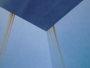 Low angle view of building against blue sky