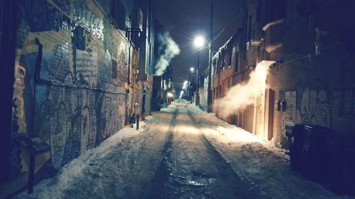 Illuminated street lights at night