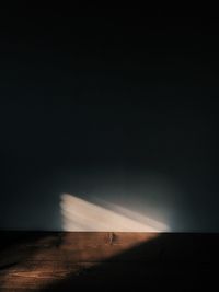 Scenic view of field against sky at night