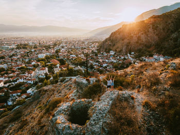 High angle view of townscape against sky during sunset