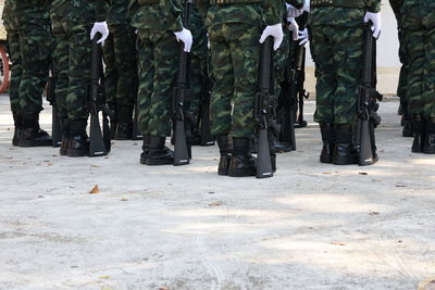 Army soldiers standing on road