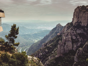 Scenic view of rocky mountains against sky