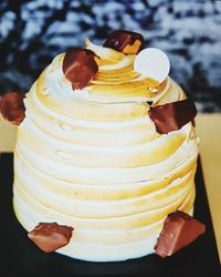 Close-up of hand holding ice cream