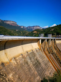 High angle view of dam by river against sky