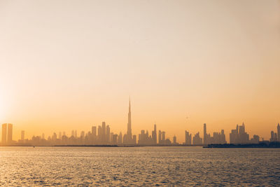 View of buildings against sky during sunset