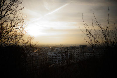 Cityscape against sky during sunset