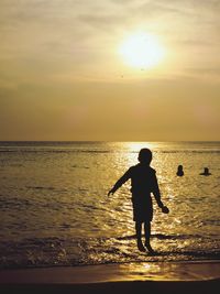 Scenic view of sea at sunset