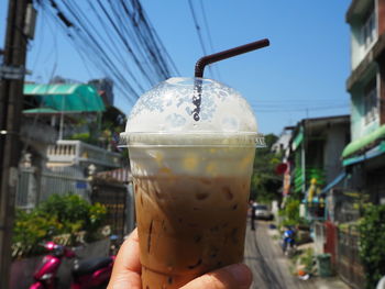 Close-up of hand holding drink