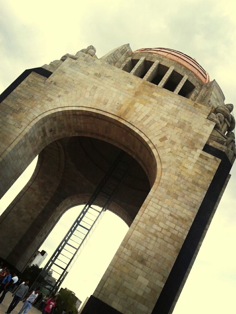 architecture, built structure, low angle view, building exterior, arch, sky, history, famous place, travel destinations, international landmark, tourism, travel, old, tower, capital cities, day, architectural feature, city, cloud - sky, outdoors