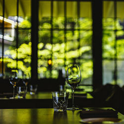 Close-up of glasses on table