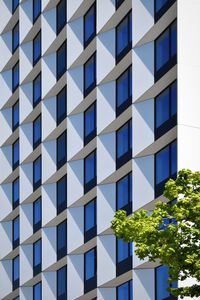 Low angle view of modern building against sky