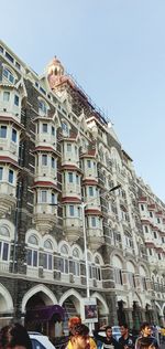 Low angle view of buildings against clear sky