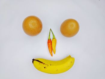 High angle view of orange fruit on table