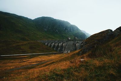 Arch bridge over mountains