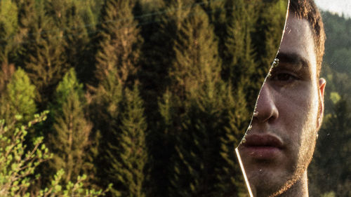 Portrait of young man looking away