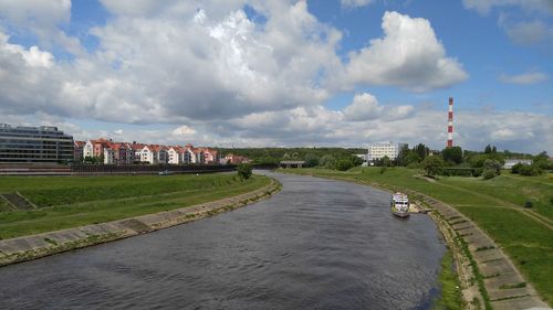 View of city against cloudy sky