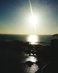 Sun shining over sea