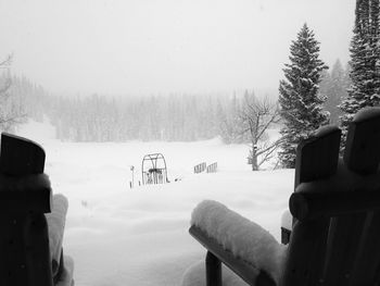 Scenic view of snow field against sky