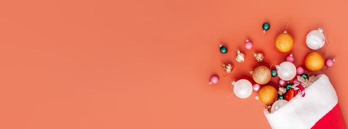 Close-up of multi colored candies against red background