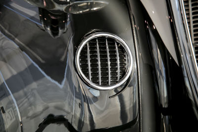 Cropped image of black vintage car headlight