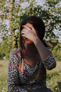 Close-up of a young woman looking away