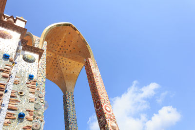 Low angle view of built structure against clear blue sky