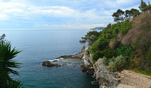 Scenic view of sea against cloudy sky