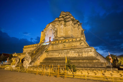 Historic temple against sky at night