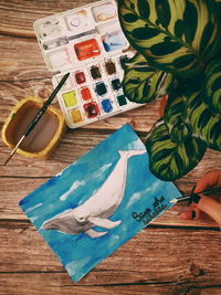 High angle view of various paper on table