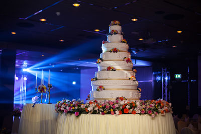 Close-up of wedding cake during celebration