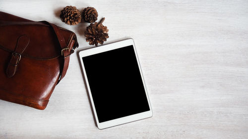 High angle view of mobile phone on table