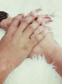 Close-up of couple hands