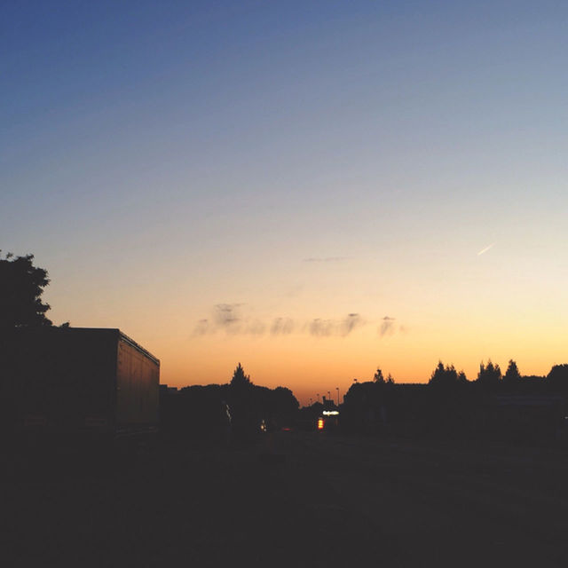 silhouette, sunset, building exterior, built structure, architecture, copy space, sky, house, dark, dusk, clear sky, residential structure, orange color, outdoors, no people, city, nature, residential building, building, beauty in nature