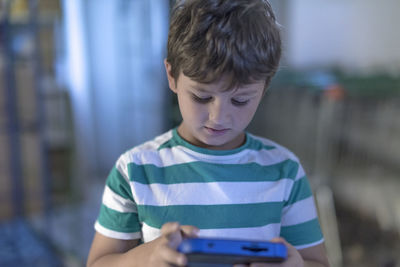 Boy using digital tablet