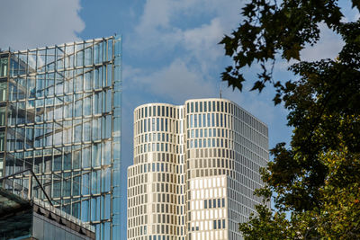 Low angle view of skyscraper against sky