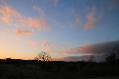 Scenic view of landscape at sunset