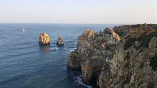 Scenic view of sea against clear sky