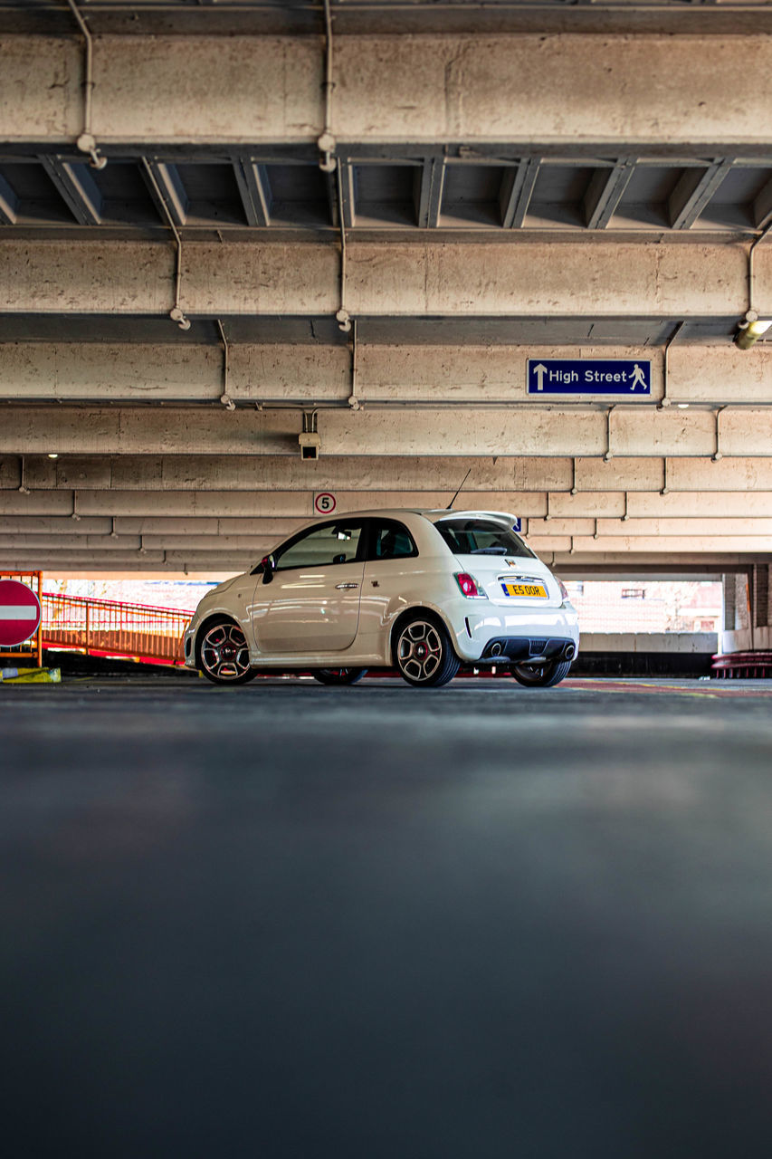 CARS PARKED AT ROADSIDE