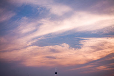 Low angle view of building against sky during sunset