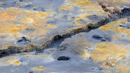 High angle view of water flowing through rocks