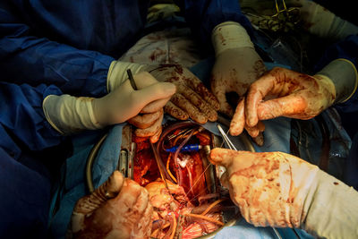 Midsection of man preparing food