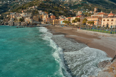 Panoramic view of beach and buildings in city