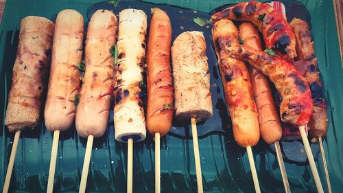 High angle view of meat on barbecue grill