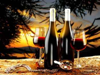 Close-up of wine bottles on table