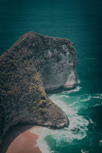 High angle view of rock formation in sea