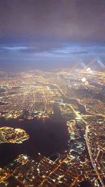 Aerial view of city at night