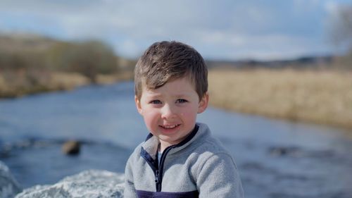 Portrait of smiling boy in water