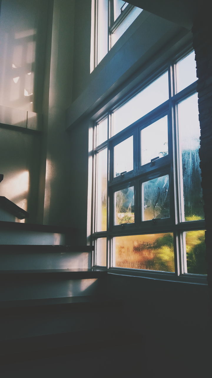 CLOSE-UP OF SUNLIGHT STREAMING THROUGH WINDOW