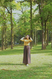 Woman standing in park