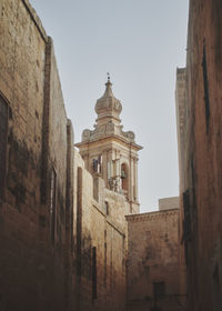 Low angle view of historic building against sky in ancient city of mdina on malta